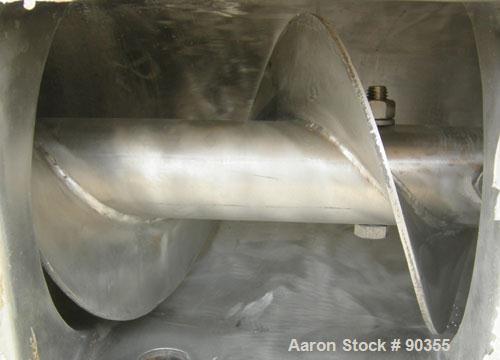 Unused-USED: Dalex screw conveyor, 304 stainless steel.  9" diameter screw x approximately 88" long x 4" pitch.  Tubular trough 10" diameter.  Driven by a 1 1/2 hp, 3/60/230/460 volt, 1750 rpm XP mot...