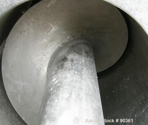 Unused-USED: Screw Conveyor, 304 stainless steel, 2 section horizontal with a vertical riser.  Horizontal section 9" diameter screw x 44" long x 4" pitch.  Trough measures 10" wide x approx. 11" deep...