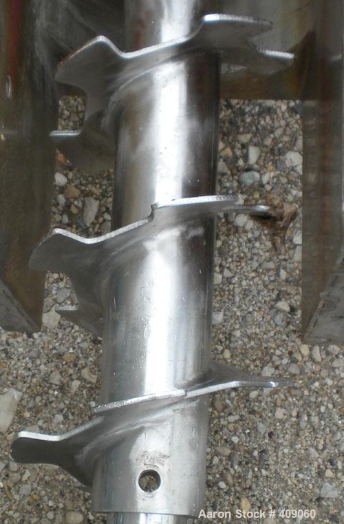 Used Continental Screw Conveyor Horizontal Screw Conveyor, 316 Stainless Steel. Approximate 9" diameter x 200" long x 5" pitch screw. Capacity 16-160 cubic feet an hour. Top end feed/end bottom outle...