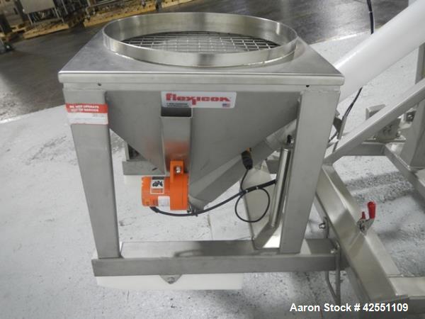 Used Flexicon feeder system, with 4" diameter x 7' long poly tube, stainless steel auger driven by 3 hp, 230/460 volt motor drive, , approximately 2" x 2" x 18" deep stainless steel feed hopper with ...