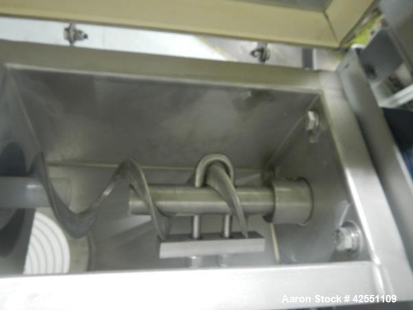 Used Flexicon feeder system, with 4" diameter x 7' long poly tube, stainless steel auger driven by 3 hp, 230/460 volt motor drive, , approximately 2" x 2" x 18" deep stainless steel feed hopper with ...