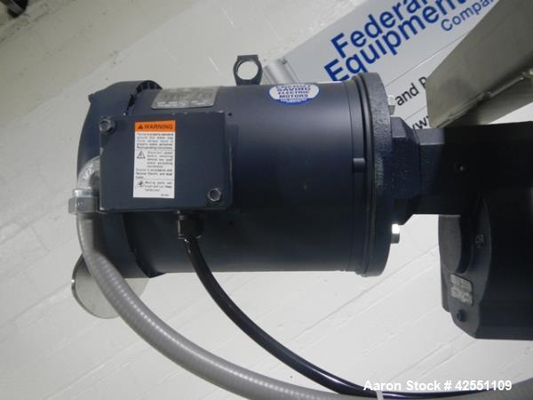 Used Flexicon feeder system, with 4" diameter x 7' long poly tube, stainless steel auger driven by 3 hp, 230/460 volt motor drive, , approximately 2" x 2" x 18" deep stainless steel feed hopper with ...