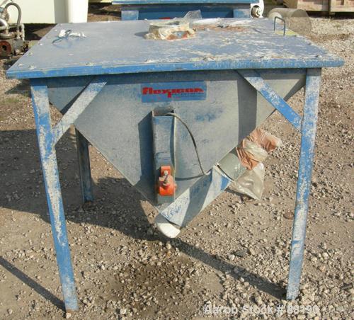 USED: Flexicon incline screw conveyor. Carbon steel hopper 36" long x 36" wide x 33" coned bottom. Bolt-on top cover. Approximate 3-1/2" diameter x 174" long, 304 stainless steel screw. Driven by a 5...