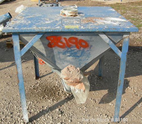 USED: Flexicon incline screw conveyor. Carbon steel hopper 36" long x 36" wide x 33" coned bottom. Bolt-on top cover. Approximate 3-1/2" diameter x 174" long, 304 stainless steel screw. Driven by a 5...