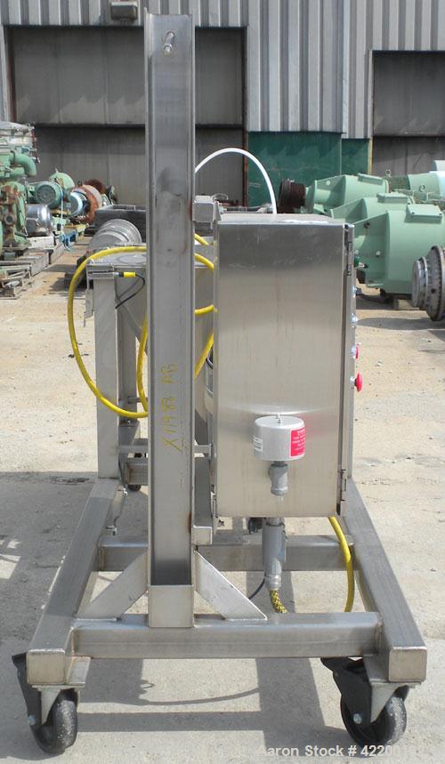 Used Hapman Mobile Helix Flexible Screw Conveyor, model DO4-HC-0302, 304 stainless steel. (2) 3-1/2’’ diameter x 180’’ long screws, 4-1/2’’ diameter stainless steel tube. Includes a 27’’ x 27’’ x 25’...
