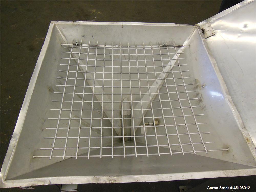 Used Hapman Flexible Screw Conveyor Parts Consisting Of: (1) 35" x 29" x 41" deep feed hopper with a 1 piece cover, (1) 1.5hp, 3/60/208-230/460 volt, 1725 rpm gear motor, ratio 10 to 1, control panel...