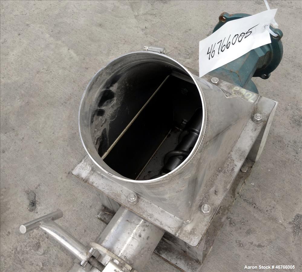 Used Hapman Flexible Screw Conveyor, 304 Stainless Steel. Approximate 2" diameter x 180" long screw. Hopper approximate 16" x 16" x 16" cone. No drive motor, drive box has 6" outfeed. Serial# X12083-...
