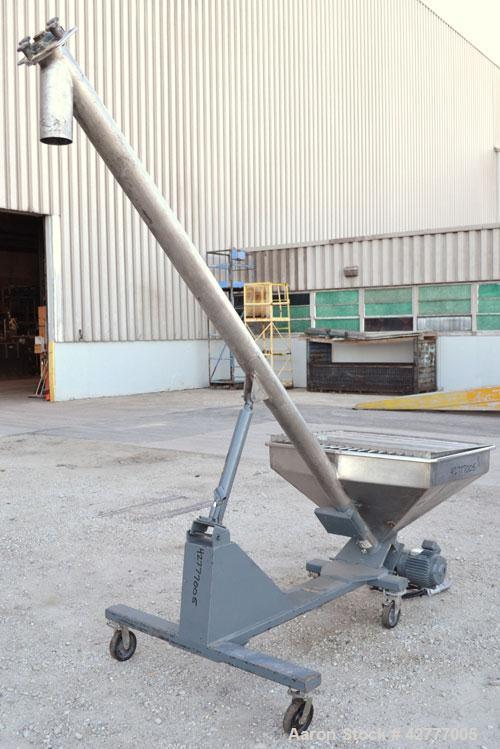 Used S. Howes Inclined Screw Conveyor, Model 4C10, 304 Stainless Steel. 4" diameter x 120" long screw. Enclosed tube. End feed hopper 40’’ wide x 30’’ long x approximately 20’’ deep with a removable ...