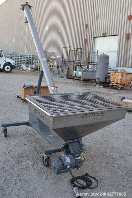 Used S. Howes Inclined Screw Conveyor, Model 4C10, 304 Stainless Steel. 4" diameter x 120" long screw. Enclosed tube. End feed hopper 40’’ wide x 30’’ long x approximately 20’’ deep with a removable ...