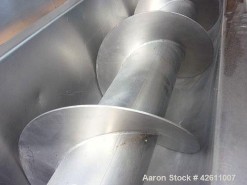 Used Material Transportation Company (MTC) Screw Conveyor, model MTCS8-18-19, stainless steel. 16" Diameter X 204" long screw. Discharge height is approximately 135 inches. Discharge opening is 18" X...
