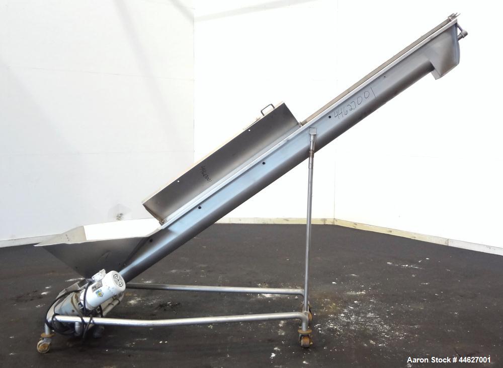 Used Mepaco Inclined Screw Conveyor, 304 Stainless Steel. Approximate 6-1/2" diameter x 136" long screw, 6-1/2" pitch. Driven by a 2hp, 3/60/208-230/460 volt, 1725 rpm gear motor, no ratio. Bottom en...