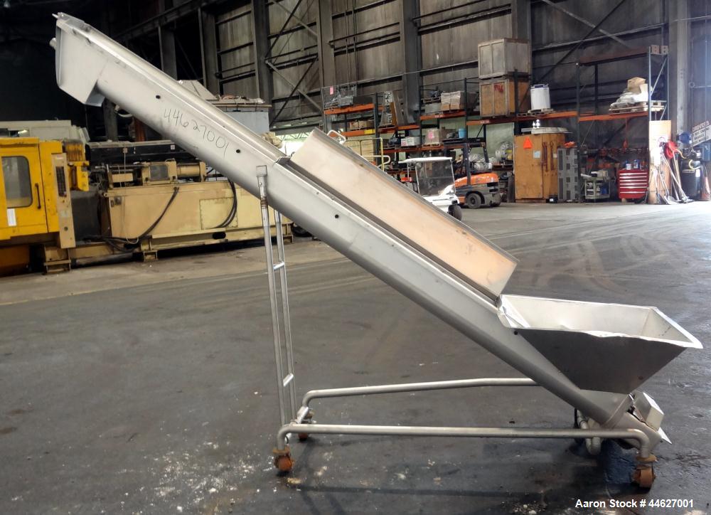 Used Mepaco Inclined Screw Conveyor, 304 Stainless Steel. Approximate 6-1/2" diameter x 136" long screw, 6-1/2" pitch. Driven by a 2hp, 3/60/208-230/460 volt, 1725 rpm gear motor, no ratio. Bottom en...
