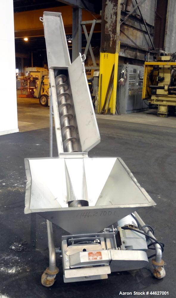 Used Mepaco Inclined Screw Conveyor, 304 Stainless Steel. Approximate 6-1/2" diameter x 136" long screw, 6-1/2" pitch. Driven by a 2hp, 3/60/208-230/460 volt, 1725 rpm gear motor, no ratio. Bottom en...