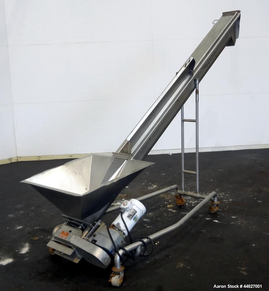Used Mepaco Inclined Screw Conveyor, 304 Stainless Steel. Approximate 6-1/2" diameter x 136" long screw, 6-1/2" pitch. Driven by a 2hp, 3/60/208-230/460 volt, 1725 rpm gear motor, no ratio. Bottom en...