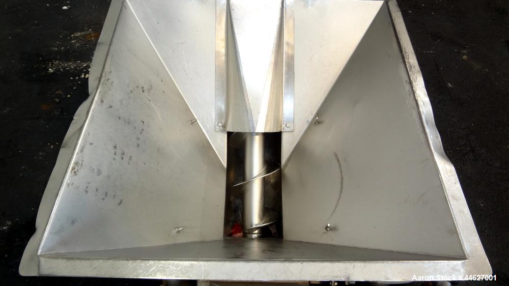Used Mepaco Inclined Screw Conveyor, 304 Stainless Steel. Approximate 6-1/2" diameter x 136" long screw, 6-1/2" pitch. Driven by a 2hp, 3/60/208-230/460 volt, 1725 rpm gear motor, no ratio. Bottom en...