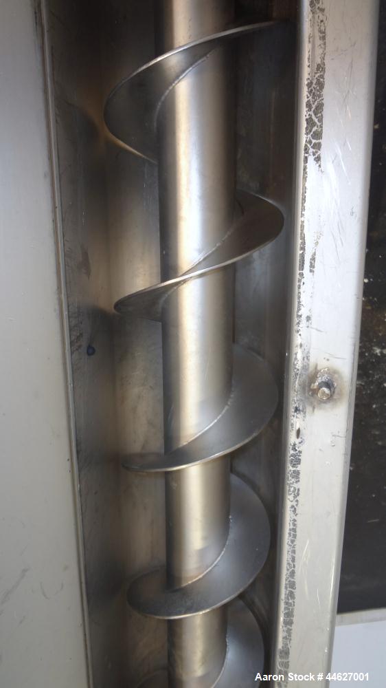 Used Mepaco Inclined Screw Conveyor, 304 Stainless Steel. Approximate 6-1/2" diameter x 136" long screw, 6-1/2" pitch. Driven by a 2hp, 3/60/208-230/460 volt, 1725 rpm gear motor, no ratio. Bottom en...