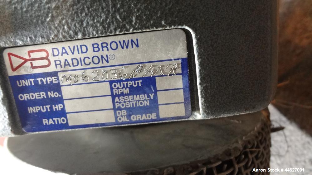 Used Mepaco Inclined Screw Conveyor, 304 Stainless Steel. Approximate 6-1/2" diameter x 136" long screw, 6-1/2" pitch. Driven by a 2hp, 3/60/208-230/460 volt, 1725 rpm gear motor, no ratio. Bottom en...