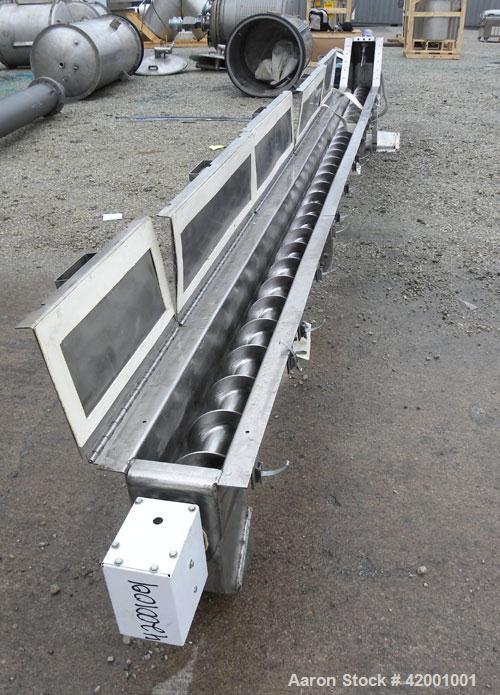 Used Inclined Screw Conveyor, 304 Stainless Steel. 6" diameter x 200" long x 3" pitch screw. 5 top cover sections. Top end feed, 7-1/2" end bottom outlet. Trough approximately 7" wide x 9" deep. Driv...