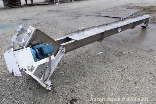 Used Inclined Screw Conveyor, 304 Stainless Steel. 6" diameter x 200" long x 3" pitch screw. 5 top cover sections. Top end feed, 7-1/2" end bottom outlet. Trough approximately 7" wide x 9" deep. Driv...
