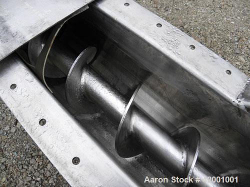 Used Inclined Screw Conveyor, 304 Stainless Steel. 6" diameter x 200" long x 3" pitch screw. 5 top cover sections. Top end feed, 7-1/2" end bottom outlet. Trough approximately 7" wide x 9" deep. Driv...