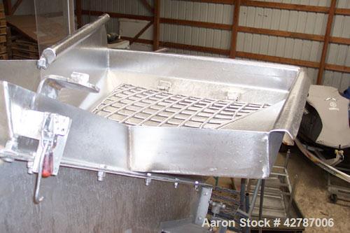 Used Inclined Screw Conveyor, 304 Stainless Steel. 9" Diameter x 101" long x 2’’ pitch screw. 10’’ Wide trough with (1) section hinged cover. End feed hopper with hinged safety grate. Top outlet, app...