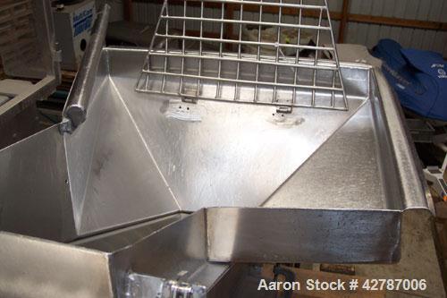 Used Inclined Screw Conveyor, 304 Stainless Steel. 9" Diameter x 101" long x 2’’ pitch screw. 10’’ Wide trough with (1) section hinged cover. End feed hopper with hinged safety grate. Top outlet, app...