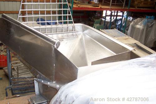 Used Inclined Screw Conveyor, 304 Stainless Steel. 9" Diameter x 101" long x 2’’ pitch screw. 10’’ Wide trough with (1) section hinged cover. End feed hopper with hinged safety grate. Top outlet, app...