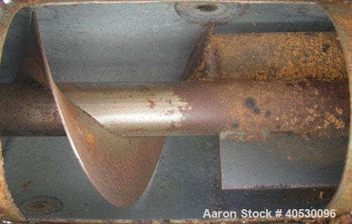 Used Screw Conveyor, Carbon Steel. Approximately 5" diameter x 252" long x 2 1/2" centers screw, enclosed tube 6" diameter. Driven by a 3 hp, 3/60/208-230/460 volt, 1735 rpm motor.
