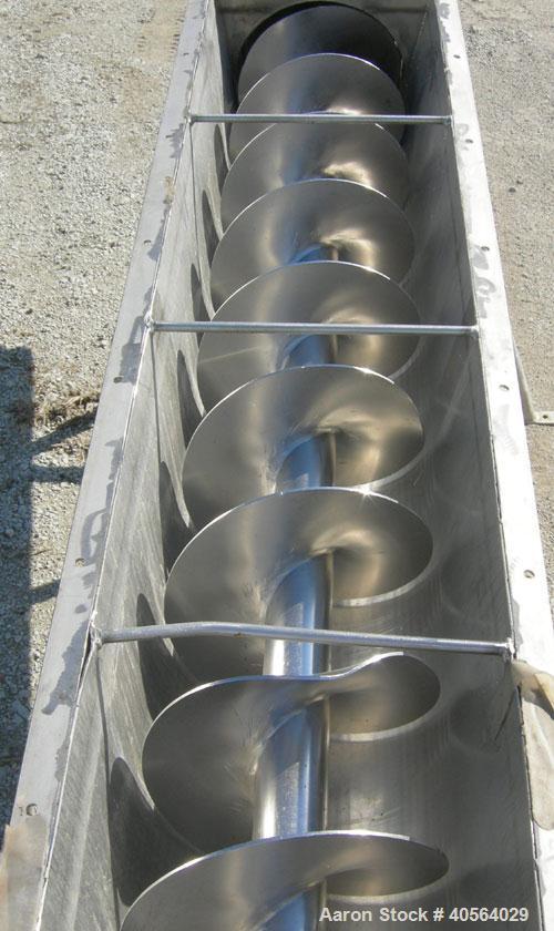 Used Incline Screw Conveyor, 304 stainless steel. 12" diameter x 95" long x 4" pitch screw. Trough 15 3/16" wide x 73 7/8" long x 13" deep. End feed and discharge, approximate 23 1/2" discharge heigh...