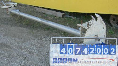 Used Screw Conveyor, 321 Stainless Steel. Approximately 4" diameter  x 128" long screw. Enclosed tube approximately 4 1/2" diameter x 128" long.  4" tri - clamp inlet/outlet.  No motor.