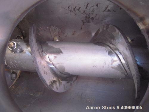 Used Inclined Screw Conveyor, 304 stainless steel. 6" diameter x 144" long x 3" pitch screw. (2) 7" end feeds, 7" end bottom outlet. Bolt on top cover. Driven by a 1 1/2 HP, 3/60/230/460 Volt, 1740 R...