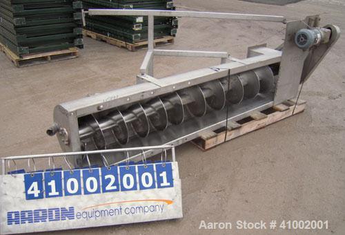 Used Inclined Screw Conveyor, 304 stainless steel. 16'' diameter x 90'' long x 3'' pitch. No top cover sections. End feed, 10 3/4'' X 16 1/4'' end bottom outlet. Driven by a 1 hp, 3/60/460 volt, 1725...