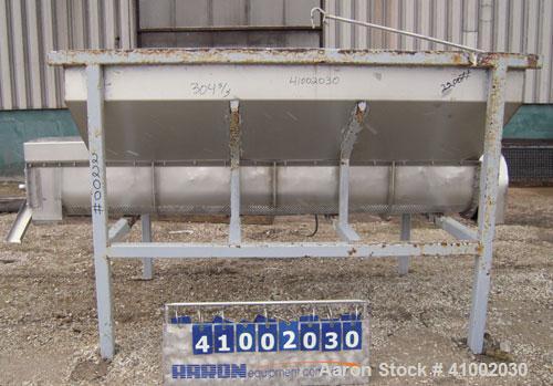 Used Dewatering Screw Conveyor, 304 stainless steel. 16" diameter x 106" long x 4 1/2" pitch screw, perforated bottom trough with 1/2" diameter holes. Top mounted hopper 62" wide x 105" long x 28" de...