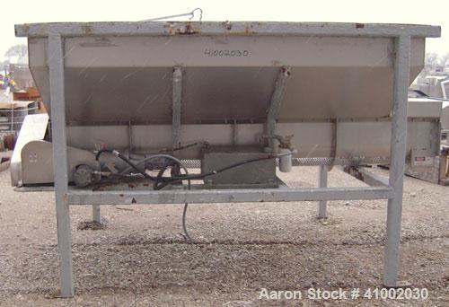 Used Dewatering Screw Conveyor, 304 stainless steel. 16" diameter x 106" long x 4 1/2" pitch screw, perforated bottom trough with 1/2" diameter holes. Top mounted hopper 62" wide x 105" long x 28" de...