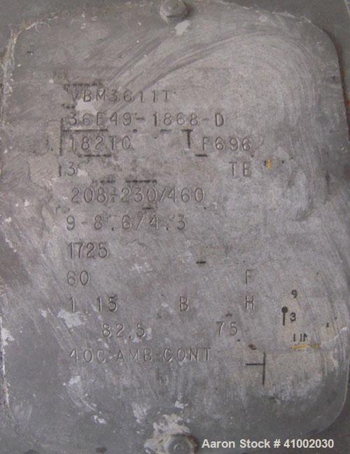 Used Dewatering Screw Conveyor, 304 stainless steel. 16" diameter x 106" long x 4 1/2" pitch screw, perforated bottom trough with 1/2" diameter holes. Top mounted hopper 62" wide x 105" long x 28" de...