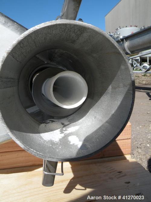 Used Prab Flexible Screw Conveyor. 4-3/8" diameter tube x approximately 108" long.  304 stainless steel 4" diameter x 108" helix/screw. 8" x 9" top end feed, 6" end bottom outlet. Driven by a 3hp, 3/...