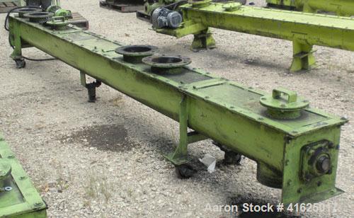 Used Screw Conveyor, Carbon Steel, Horizontal. Approximate 9" diameter x 175" long x 3" pitch screw. 8" top end feed/end bottom outlet. Trough measures approximately 10" wide x 11" deep. 4 piece bolt...