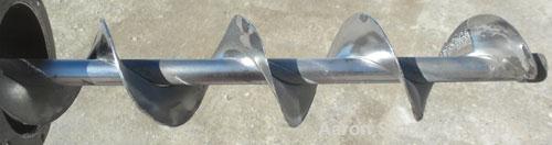 Used Screw Conveyor, Carbon Steel. Approximately 4 1/2" diameter x 238" long x 2" pitch. 5" diameter tubular trough. 4" x 8" top inlet, missing end cap. Driven by a 2 hp, 3/60/208-230/460 volt, 1160 ...
