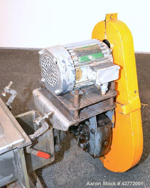 Used Screw Conveyor, 304 Stainless Steel, Horizontal. Approximate 9'' diameter x 141'' long x 4-1/2'' pitch screw. Trough 10'' wide x 11'' deep with (3) cover sections. Driven by a 2 hp, 3/60/230/460...