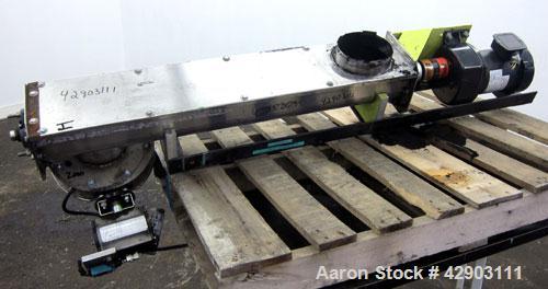 Used Screw Conveyor, 304 Stainless Steel. Approximate 5" diameter x 38" long. Top cover. Top end feed, bottom end outlet. Driven by a 1/2hp, 3/60/208-230/460 volt gear motor, ratio 42.8 to 1. Mounted...
