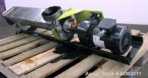 Used Screw Conveyor, 304 Stainless Steel. Approximate 5" diameter x 38" long. Top cover. Top end feed, bottom end outlet. Driven by a 1/2hp, 3/60/208-230/460 volt gear motor, ratio 42.8 to 1. Mounted...
