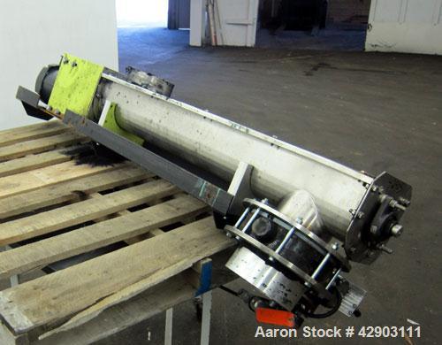 Used Screw Conveyor, 304 Stainless Steel. Approximate 5" diameter x 38" long. Top cover. Top end feed, bottom end outlet. Driven by a 1/2hp, 3/60/208-230/460 volt gear motor, ratio 42.8 to 1. Mounted...