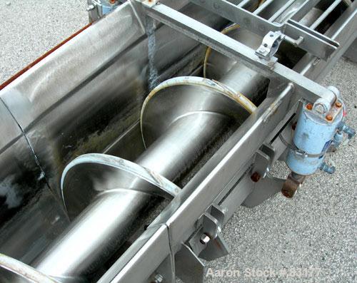 USED: Screw Conveyor, 304 stainless steel, horizontal. 14" diameter x 26' long x 6" pitch screw. Approximately 1/2" thick Teflon screw tip. Top feed, end bottom outlet. Top safety grate sections, 5 a...