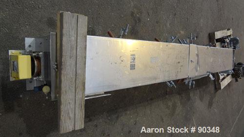 Used Dalex Screw Conveyor, 304 Stainless Steel, Horizontal. 9" Diameter x 111" long x 4" pitch screw. 10'' x 10'' Side opening, (3) 10'' bottom outlets. Trough measures 10" wide x 122" long x approxi...