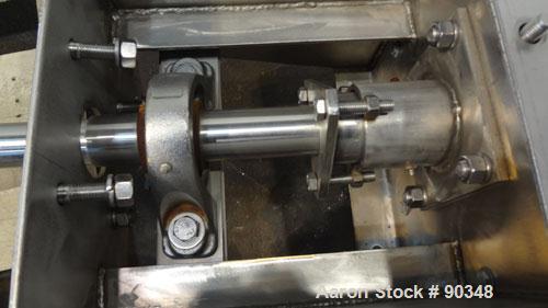 Used Dalex Screw Conveyor, 304 Stainless Steel, Horizontal. 9" Diameter x 111" long x 4" pitch screw. 10'' x 10'' Side opening, (3) 10'' bottom outlets. Trough measures 10" wide x 122" long x approxi...