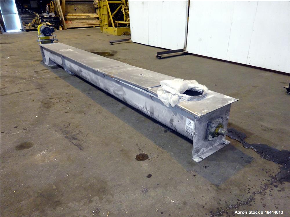 Used Nord-Sen Metal Industries Screw Conveyor, Stainless Steel. Approximate 12" diameter x 180" long x 6" pitch screw. Driven by a 3hp, 3/60/208-230/460 volt, 1760 rpm motor thru a Dodge torque arm r...