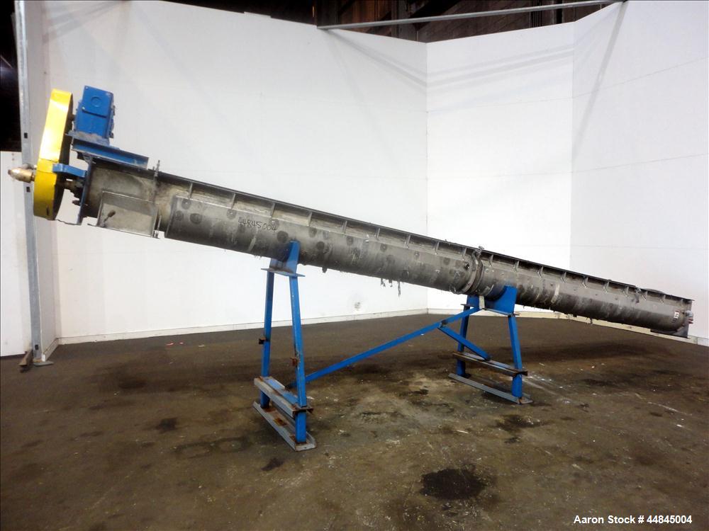 Used Ohio Inclined Screw Conveyor, 304 Stainless Steel. Approximate 12" diameter x 239" long x 3-1/2" pitch cored screw, driven by a 2 hp, 180 volt, 1750 rpm gear motor, no gear ratio. Jacketed troug...