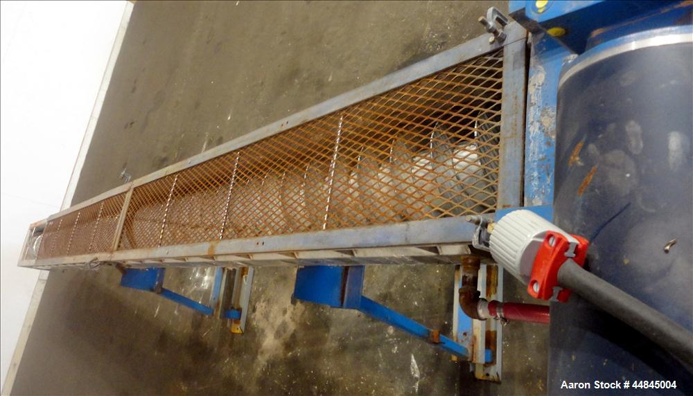 Used Ohio Inclined Screw Conveyor, 304 Stainless Steel. Approximate 12" diameter x 239" long x 3-1/2" pitch cored screw, driven by a 2 hp, 180 volt, 1750 rpm gear motor, no gear ratio. Jacketed troug...