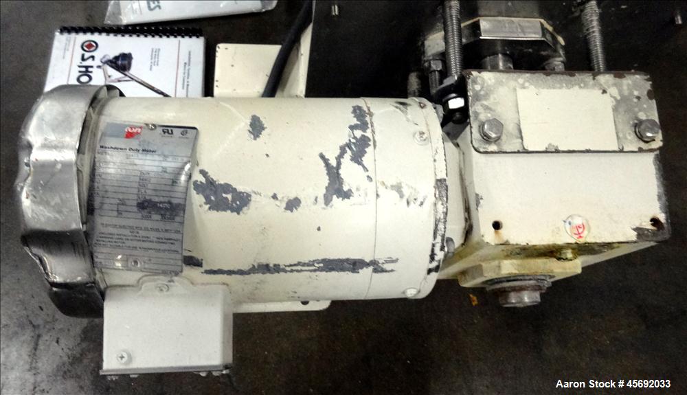 Used S. Howes Split Tube Screw Conveyor, Stainless Steel. 4" diameter x 156" long screw. Approximate capacity 70 to 120 feet. Hinged screw covers. Stainless Steel feed hopper 36" diameter x 13" strai...
