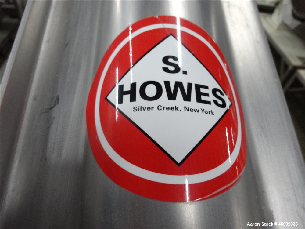 Used S. Howes Split Tube Screw Conveyor, Stainless Steel. 4" diameter x 156" long screw. Approximate capacity 70 to 120 feet. Hinged screw covers. Stainless Steel feed hopper 36" diameter x 13" strai...